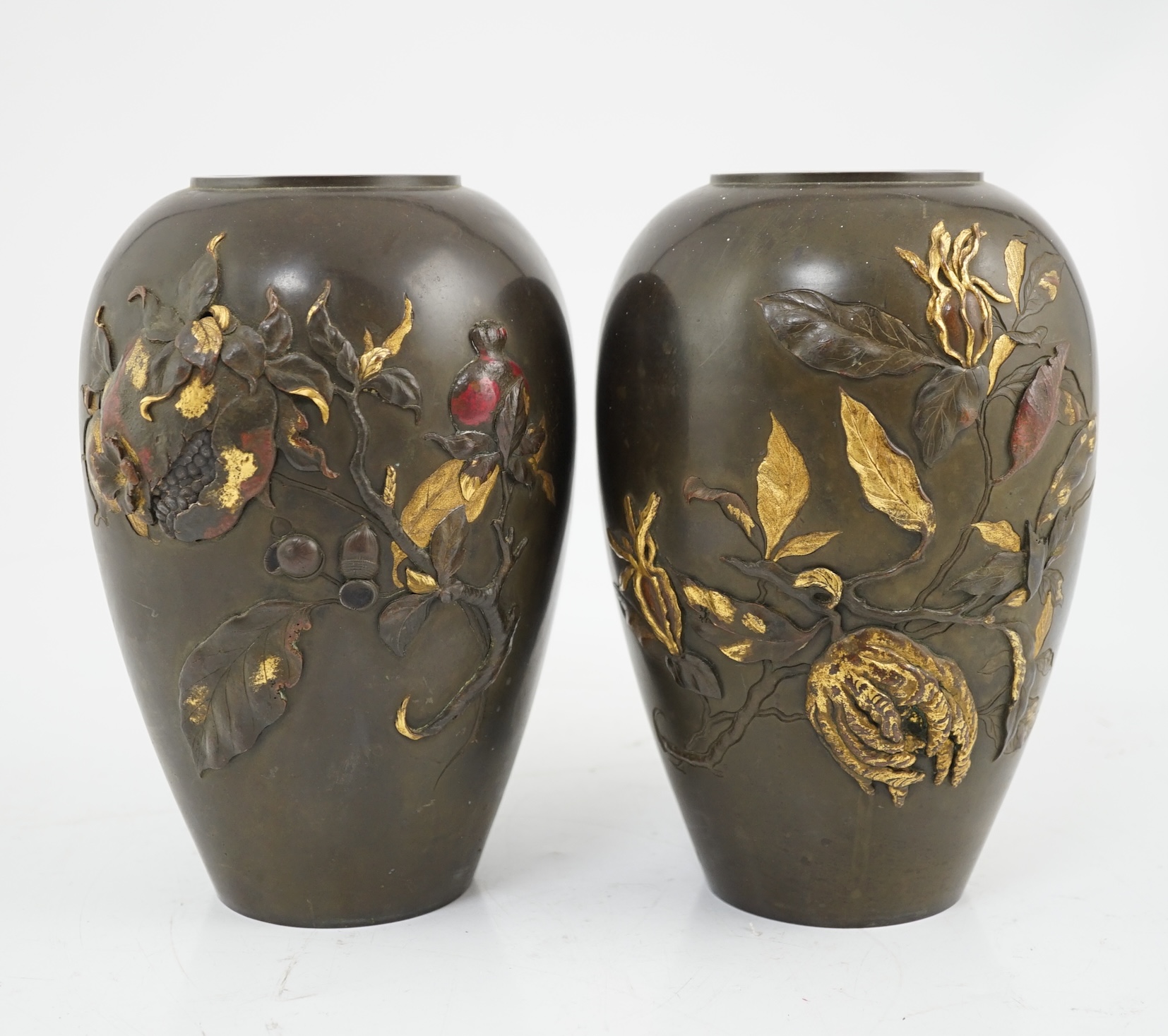 A pair of Japanese bronze and mixed metal ovoid vases, Meiji period